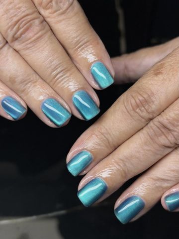 Blue cateye: Chrome & Cat-Eye and Seasonal nails by Evil With Elegance, Miami