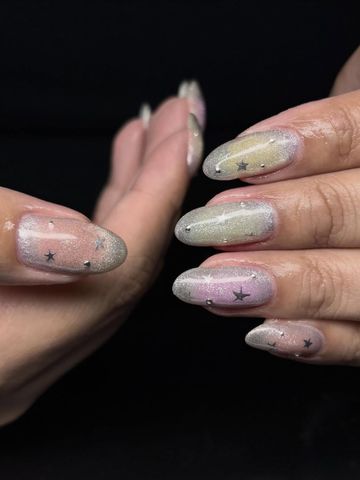 Fun star set: Chrome & Cat-Eye nails by Evil With Elegance, Miami