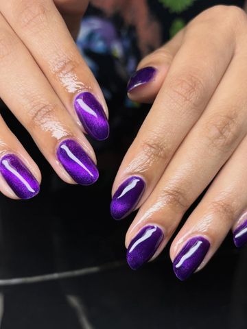 Cateye gel mani: Chrome & Cat-Eye nails by Evil With Elegance, Miami